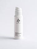 A white cylindrical skincare pump bottle with a black logo and text reading 'DERT Brightening Facial Exfoliator' on a clean white background.